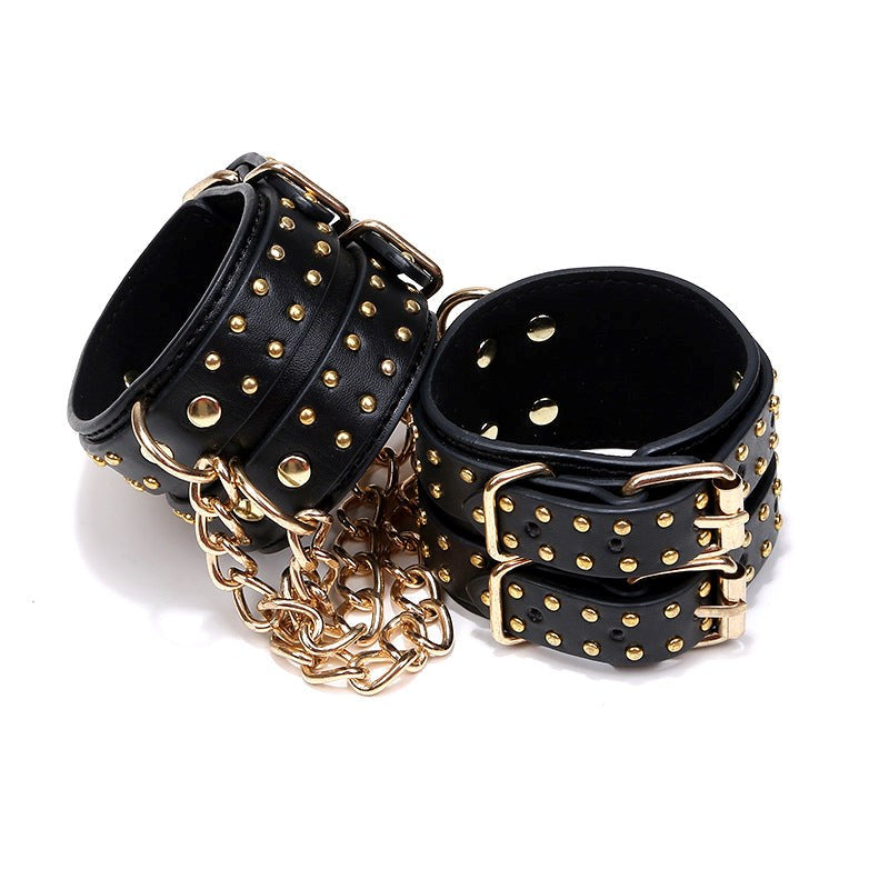 Studded Wrist Cuffs With Chain - - Rabbit Vibrators