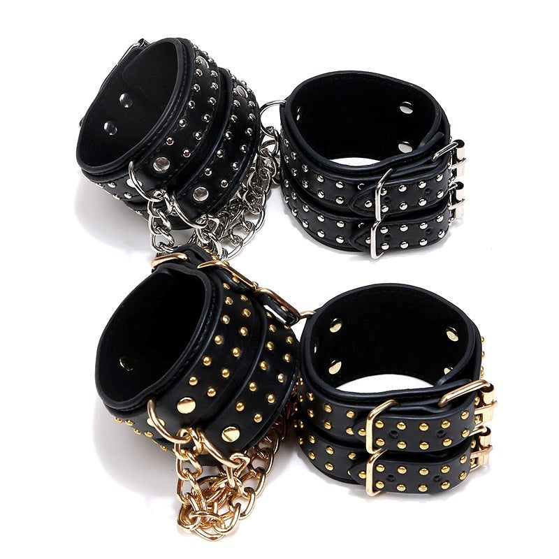 Studded Wrist Cuffs With Chain - - Rabbit Vibrators